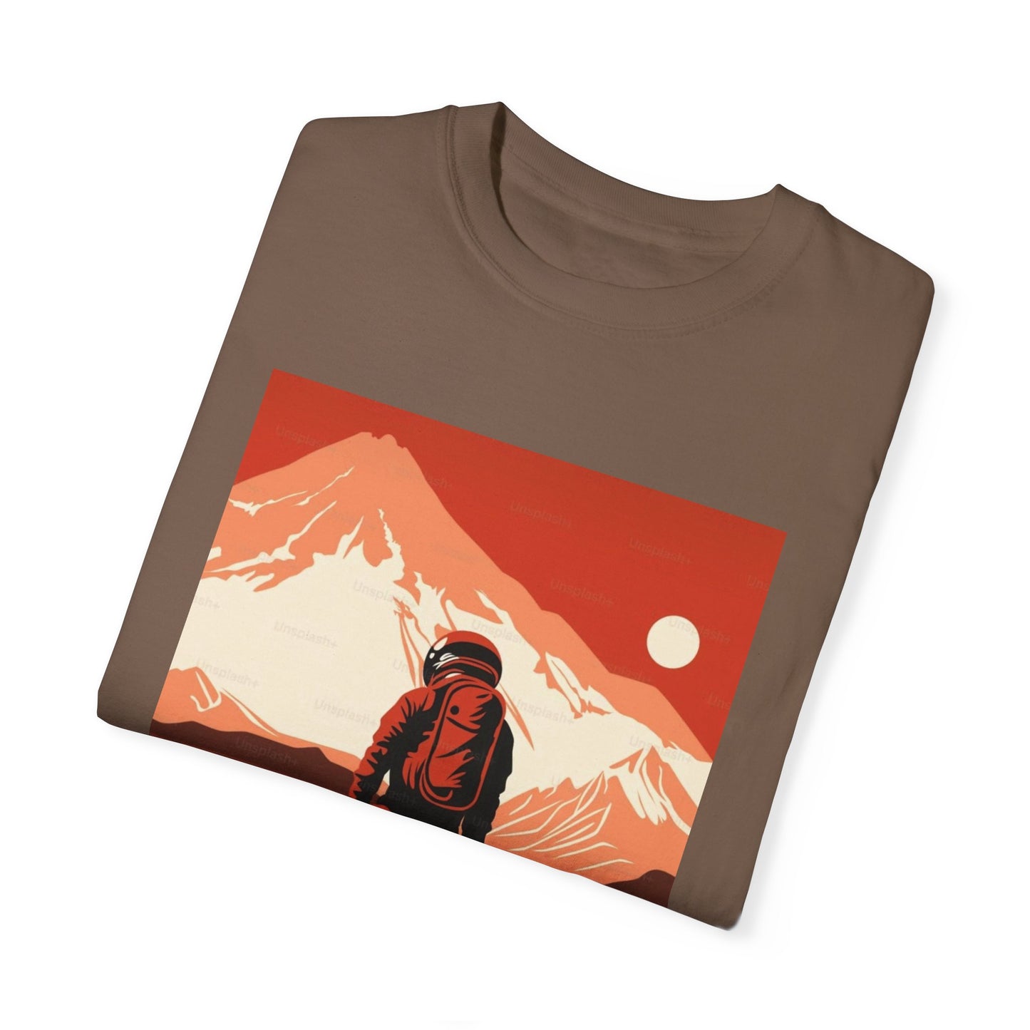 Lifestyle shot of a person wearing the Man On Mars Graphic T-Shirt during an outdoor festival, highlighting its versatility and casual vibe.