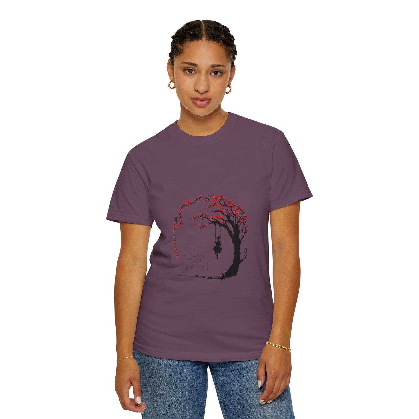 Flat lay of the Cherry Blossom Unisex T-Shirt, featuring its soft organic cotton texture and vibrant graphic design.