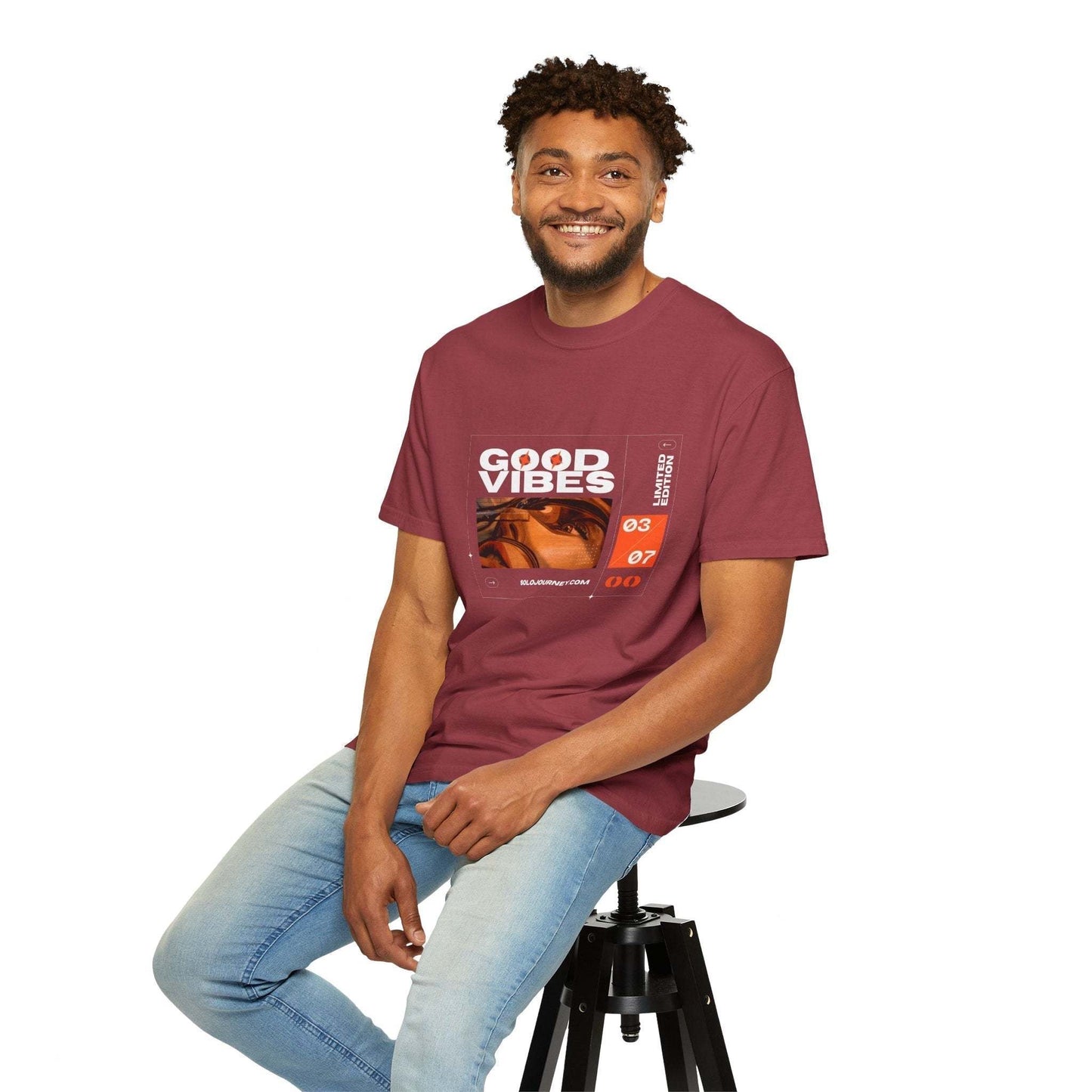 Flat lay of the Good Vibes Graphic Design Pullover alongside eco-friendly accessories, emphasizing its vintage aesthetic and sustainable fashion appeal.
