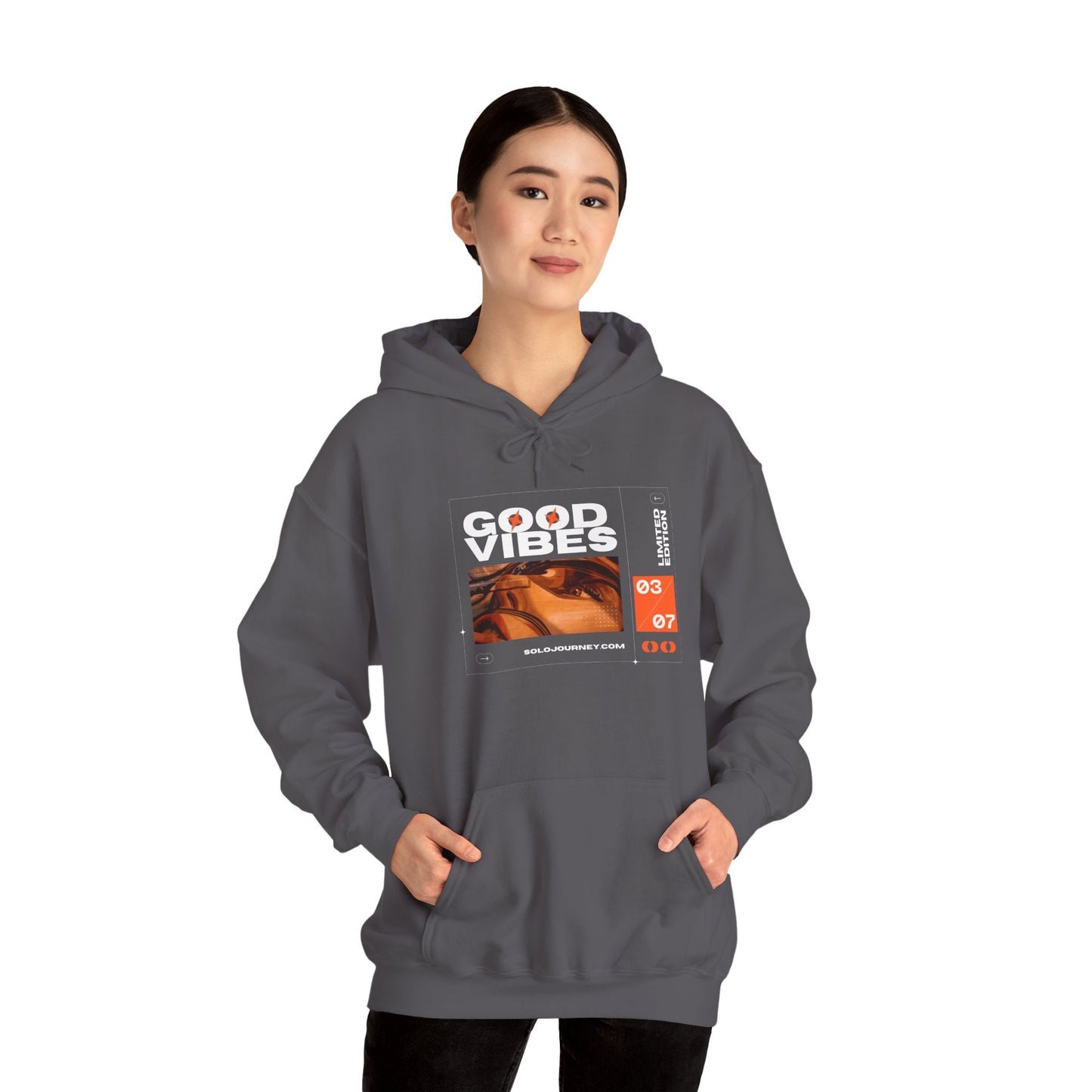 Back view of Good Vibes Unisex Heavy Blend Hoodie showcasing its relaxed fit and unique graphic print.