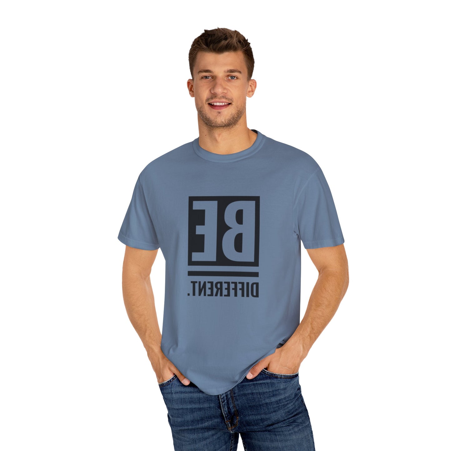 Flat lay of the Be Different Art Graphic Oversized Boho T-Shirt highlighting its soft organic cotton texture and unique graphics.