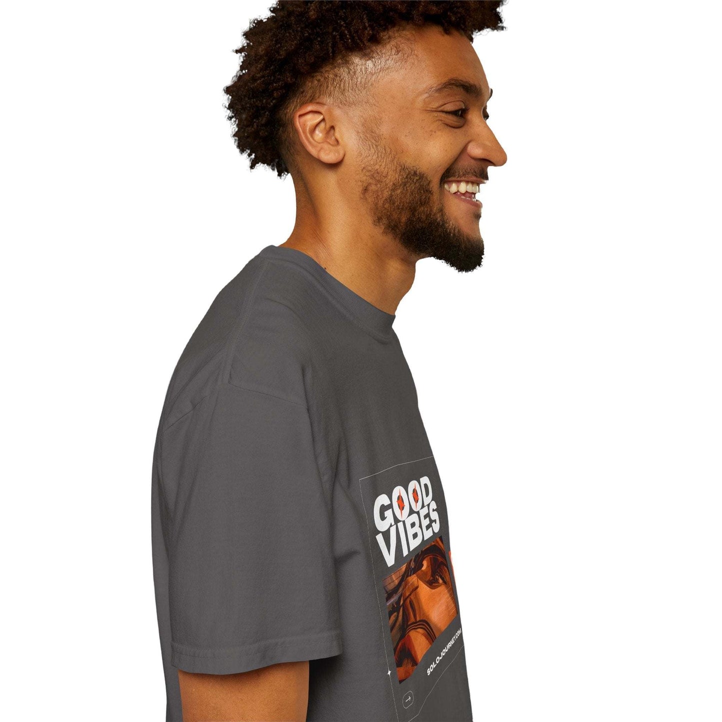 Lifestyle shot of the Good Vibes Graphic Design Pullover - Vintage Boho Oversized T-Shirt emphasizing its comfort and casual wear.