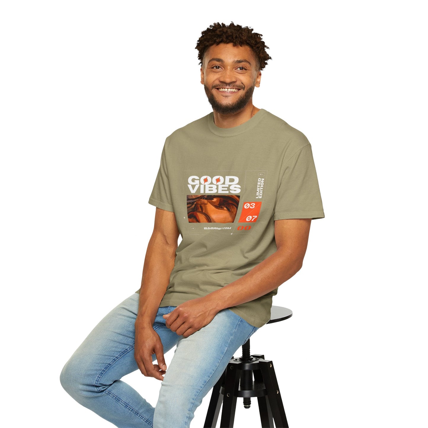 Good Vibes Graphic Design Pullover - Vintage Boho Oversized T-Shirt in Organic Cotton displayed on a model outdoors, showcasing its comfortable fit and unique graphic design.