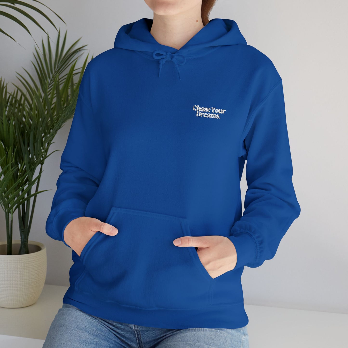 Chase Your Dreams Vintage Aesthetic Oversized Hoodie worn outdoors, emphasizing its versatility for casual outings and adventures.