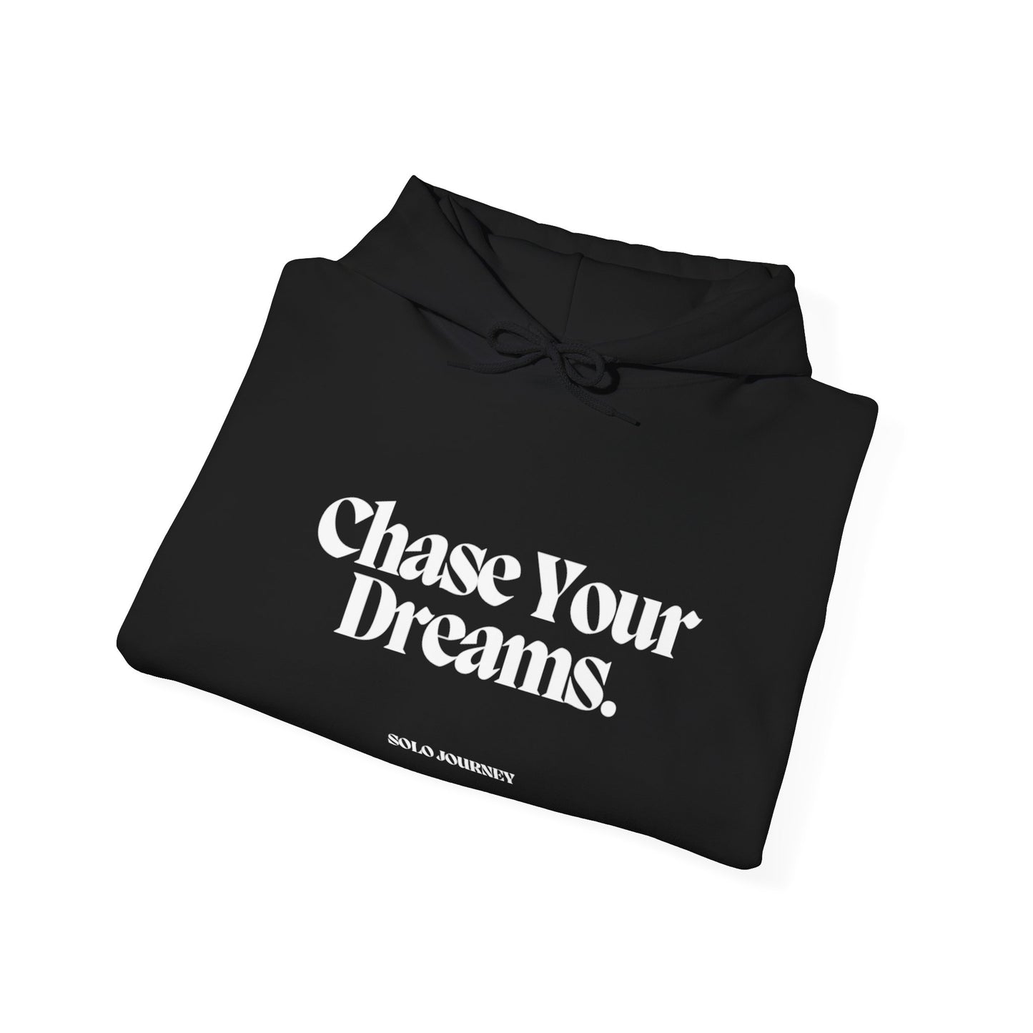 Chase Your Dreams Hoodie in a cozy setting, showcasing its motivational design and eco-friendly cotton fabric.