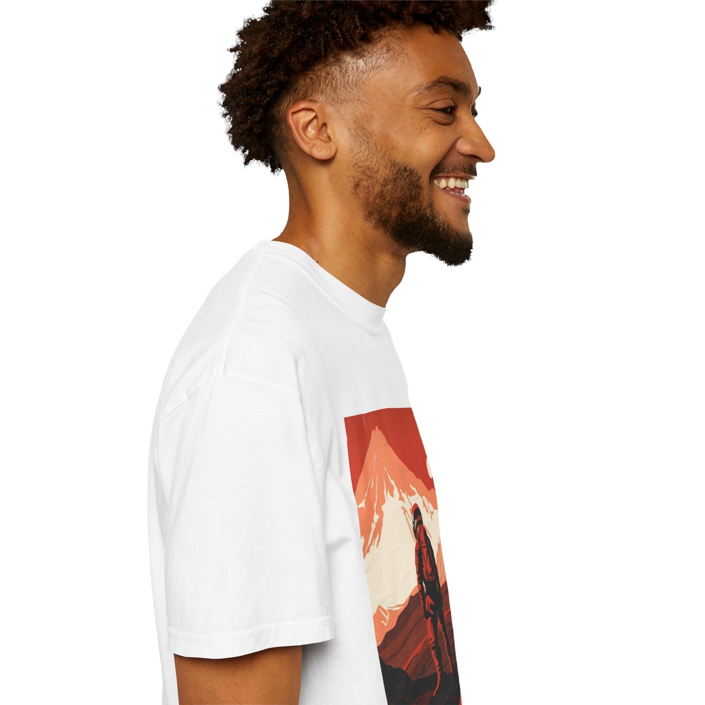 Stylish display of the Man On Mars Graphic T-Shirt laid flat, showcasing its oversized boho fit and eco-friendly fabric details.