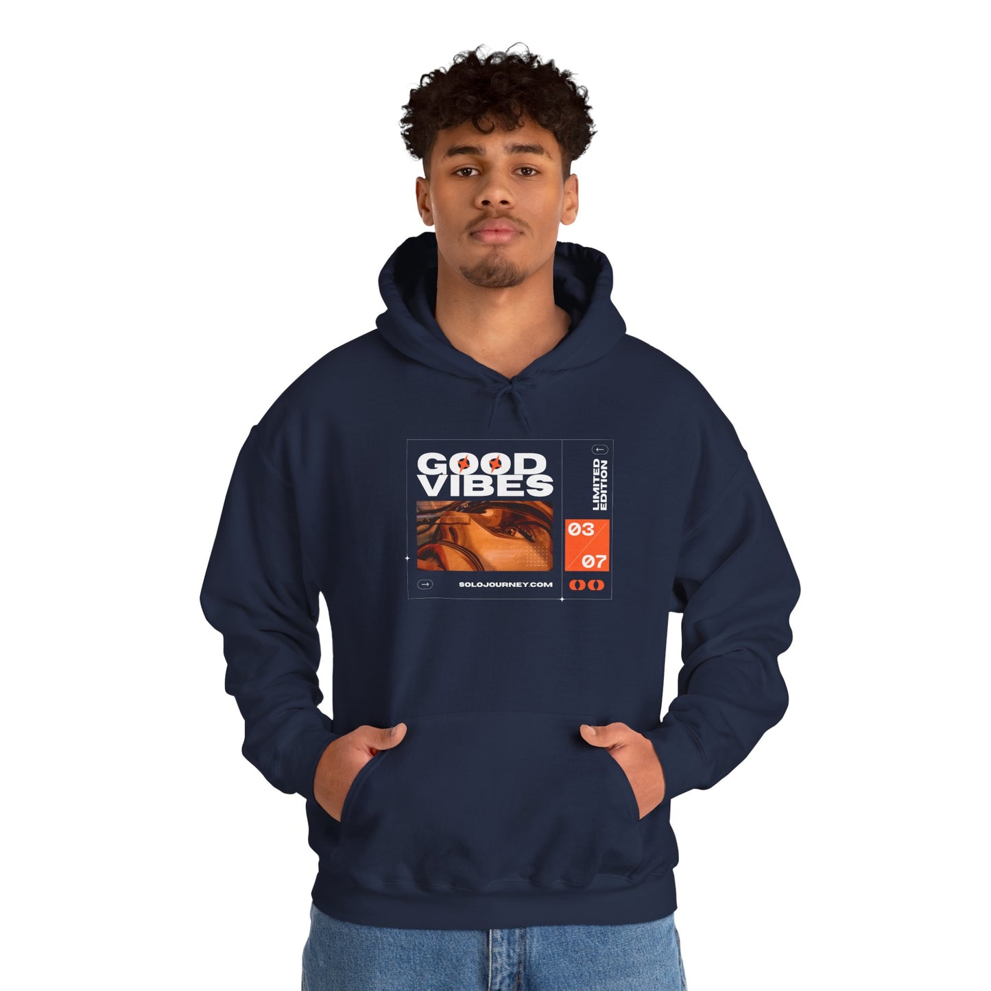 Flat lay of the Good Vibes Unisex Heavy Blend Hoodie paired with casual accessories, emphasizing its versatility for fashion-forward individuals.