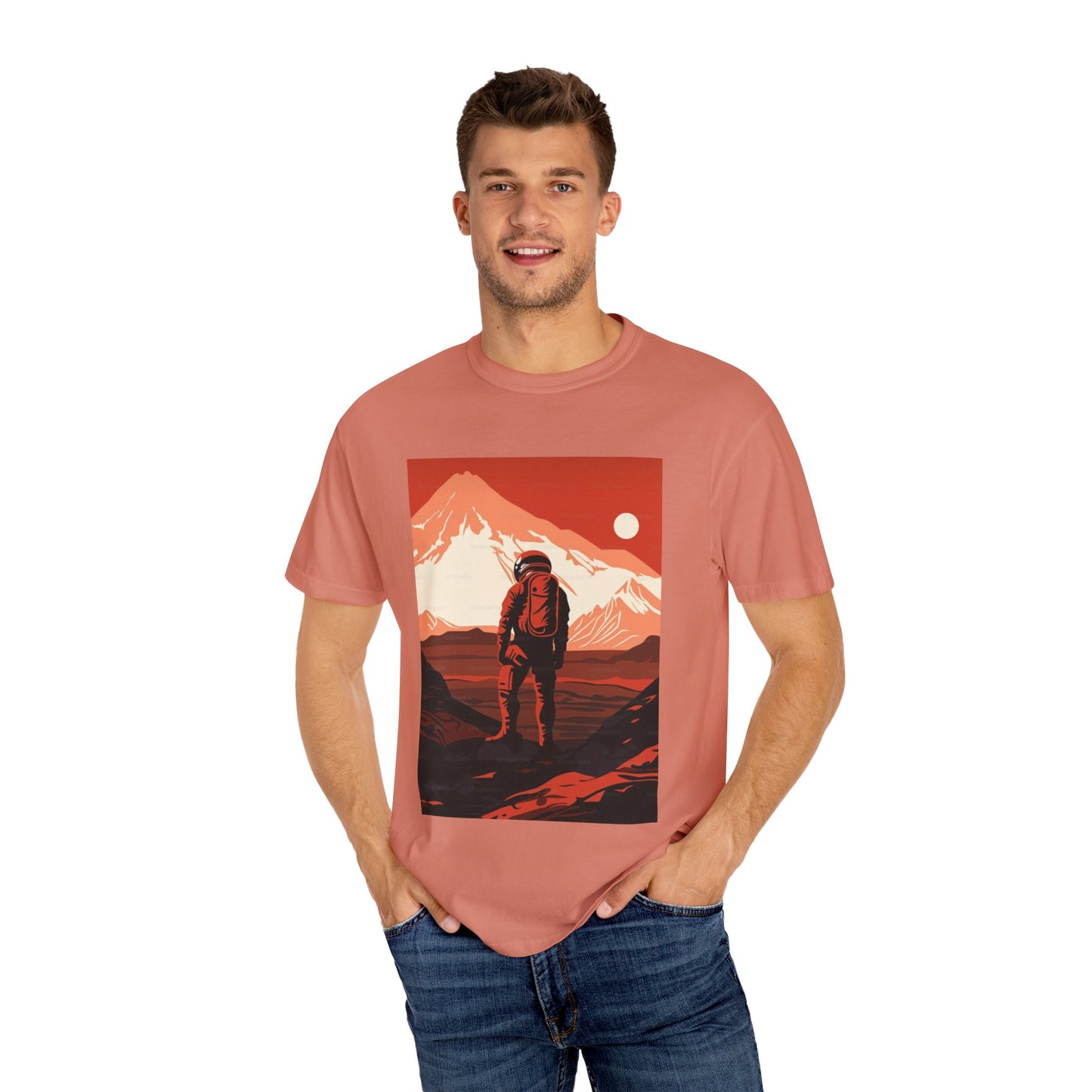 Man On Mars Graphic T-Shirt displayed on a wooden hanger, highlighting the eco-friendly organic cotton fabric of this oversized unisex boho tee.