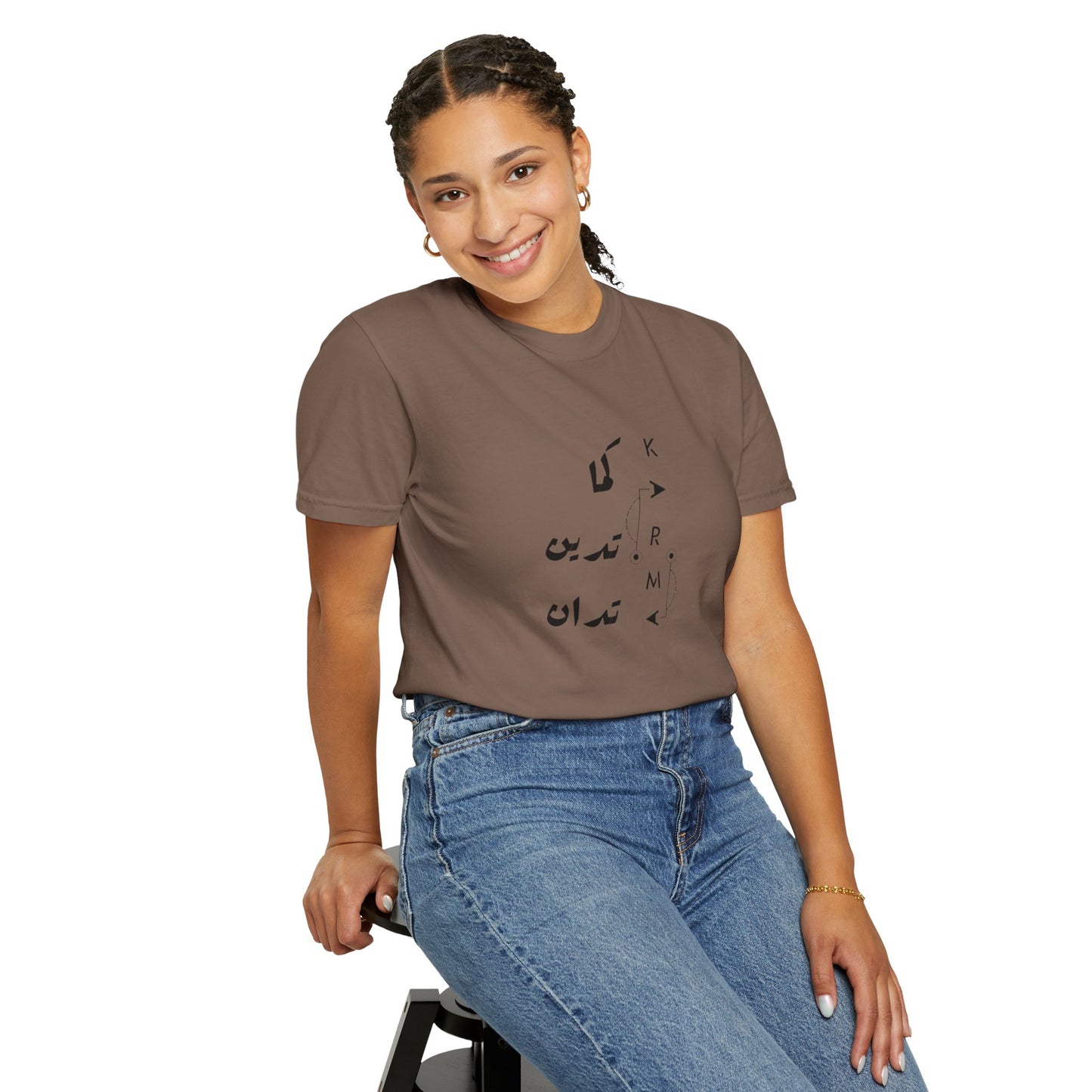 Stylish woman wearing the Karma Has Its Ways Vintage Aesthetic Pullover Tee paired with high-waisted jeans.
