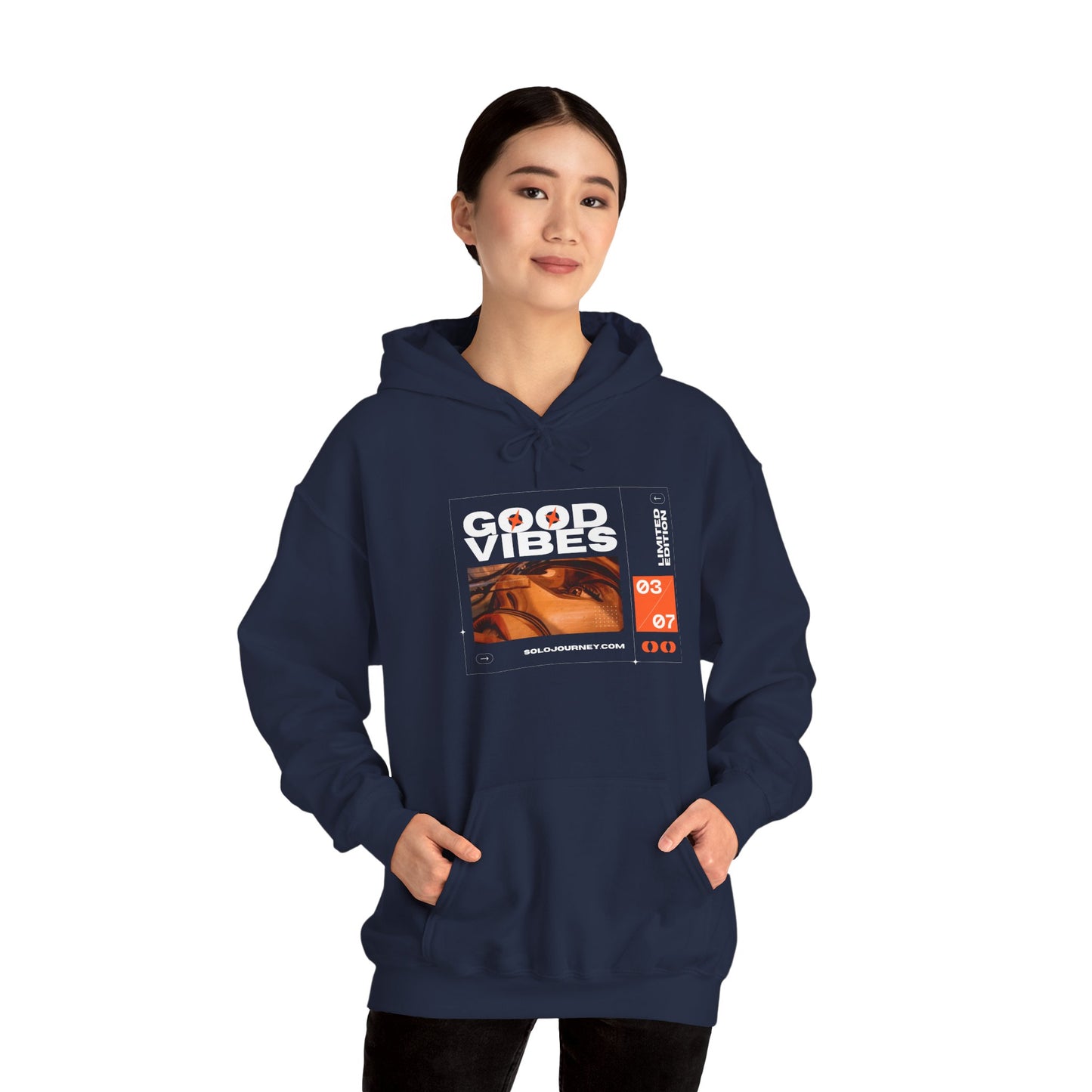 Back view of the Good Vibes Unisex Heavy Blend Hoodie, demonstrating the cozy fit and eco-friendly materials ideal for any casual occasion.