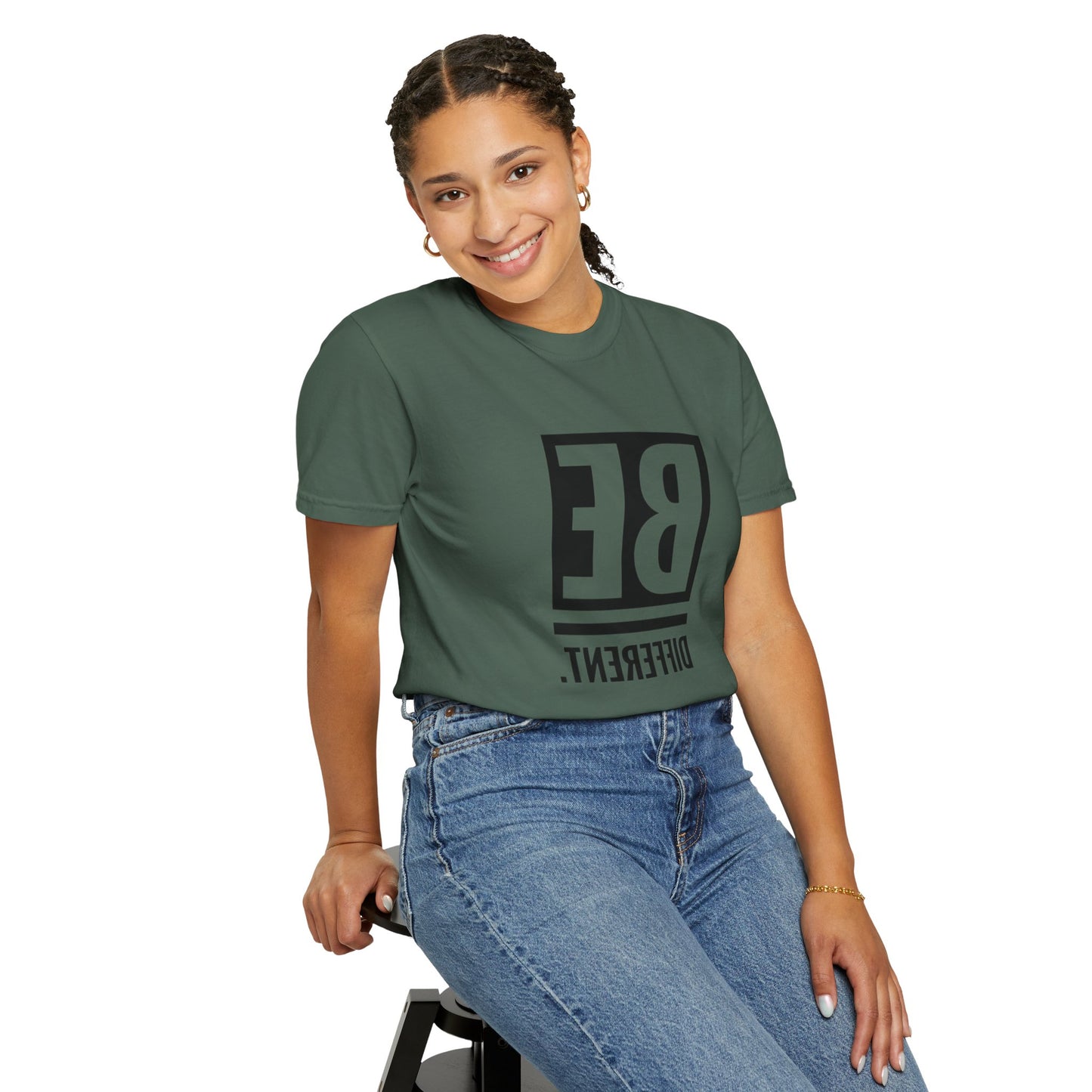 Person wearing the Be Different Art Graphic Oversized Boho T-Shirt, enjoying casual outdoor vibes while promoting sustainable fashion.