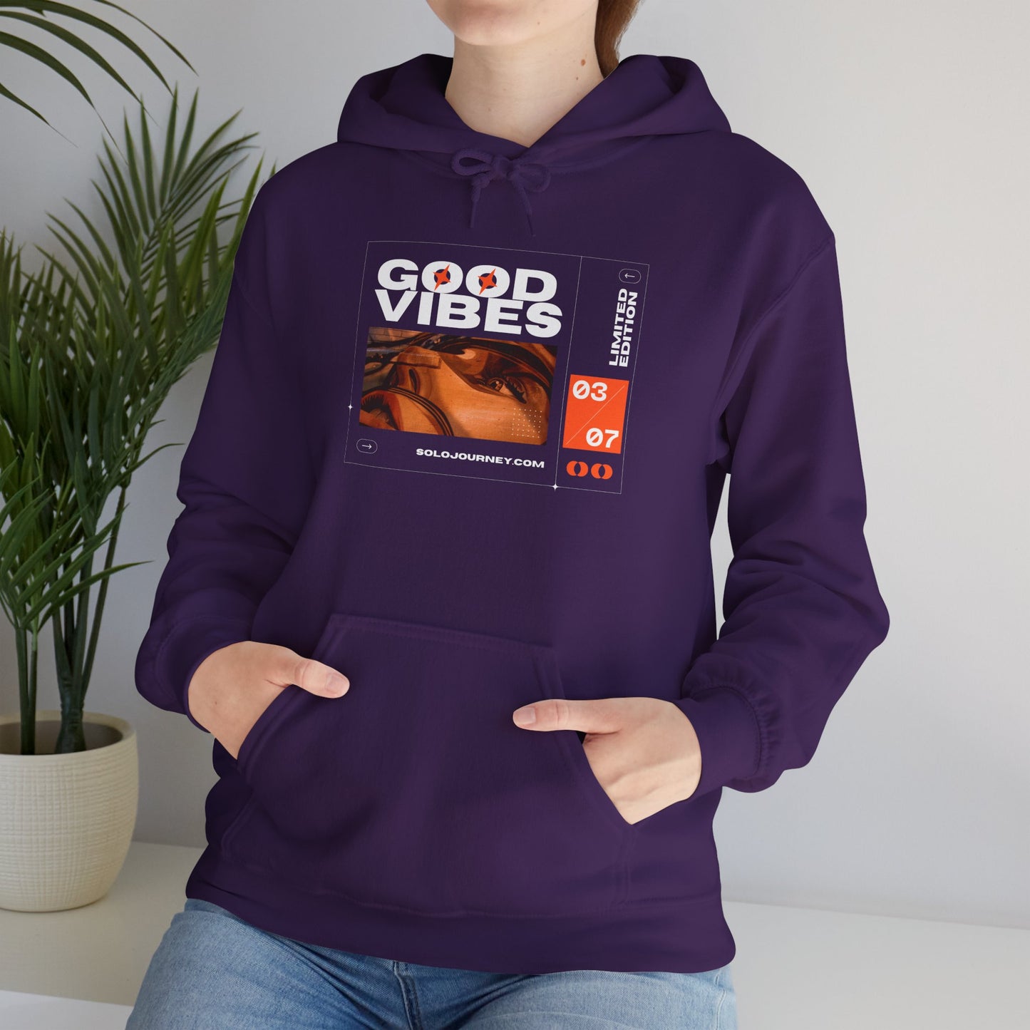 Good Vibes Unisex Heavy Blend Hoodie - Eco-Friendly Organic Cotton Sweatshirt showcasing comfort and style, perfect for casual outings or cozy lounging.