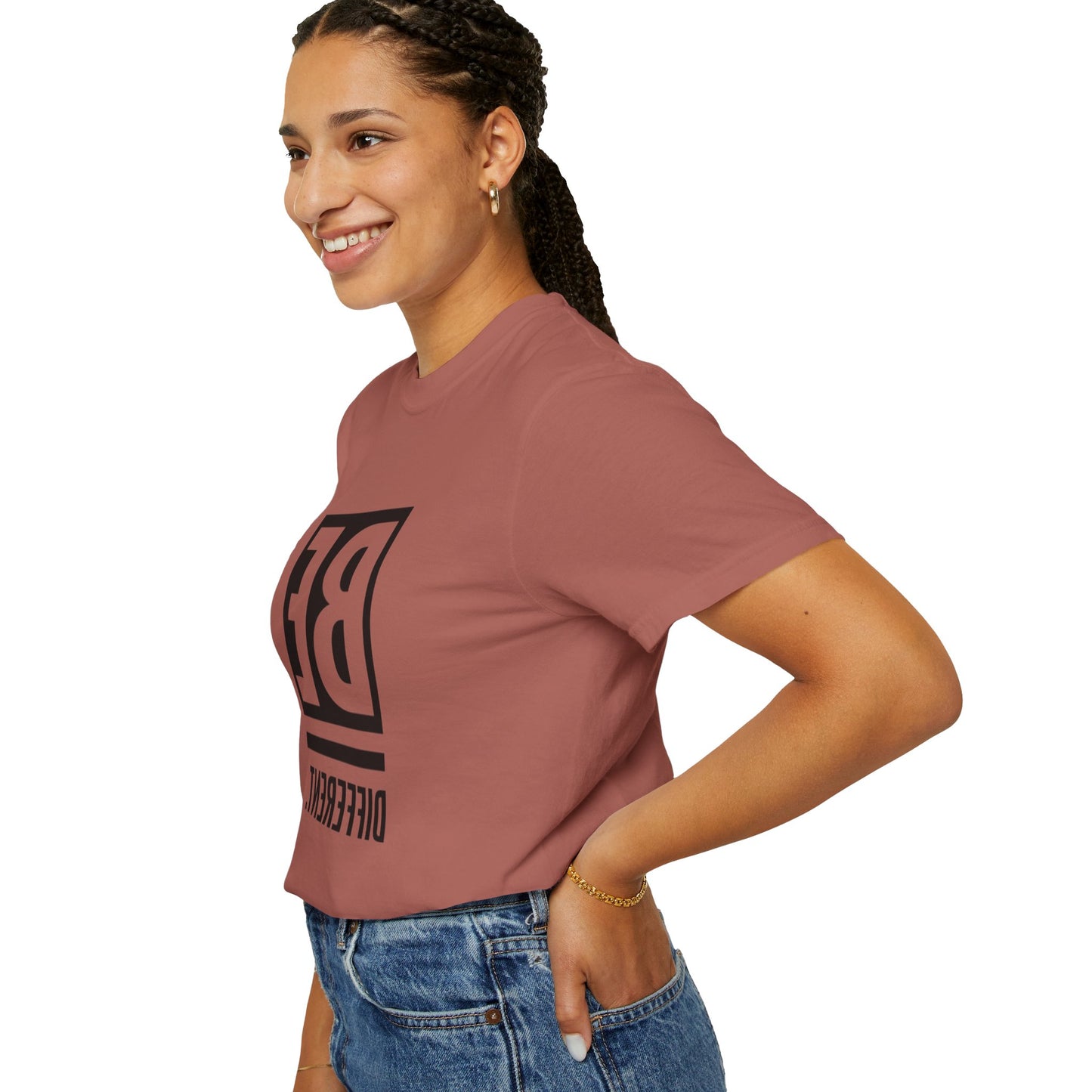 Model wearing Be Different Art Graphic Oversized Boho T-Shirt styled with high-waisted jeans for a casual look.