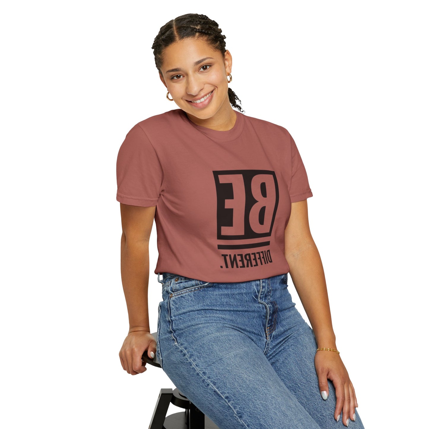 Be Different Art Graphic Oversized Boho T-Shirt displayed on a hanger to showcase its relaxed fit and lightweight design.
