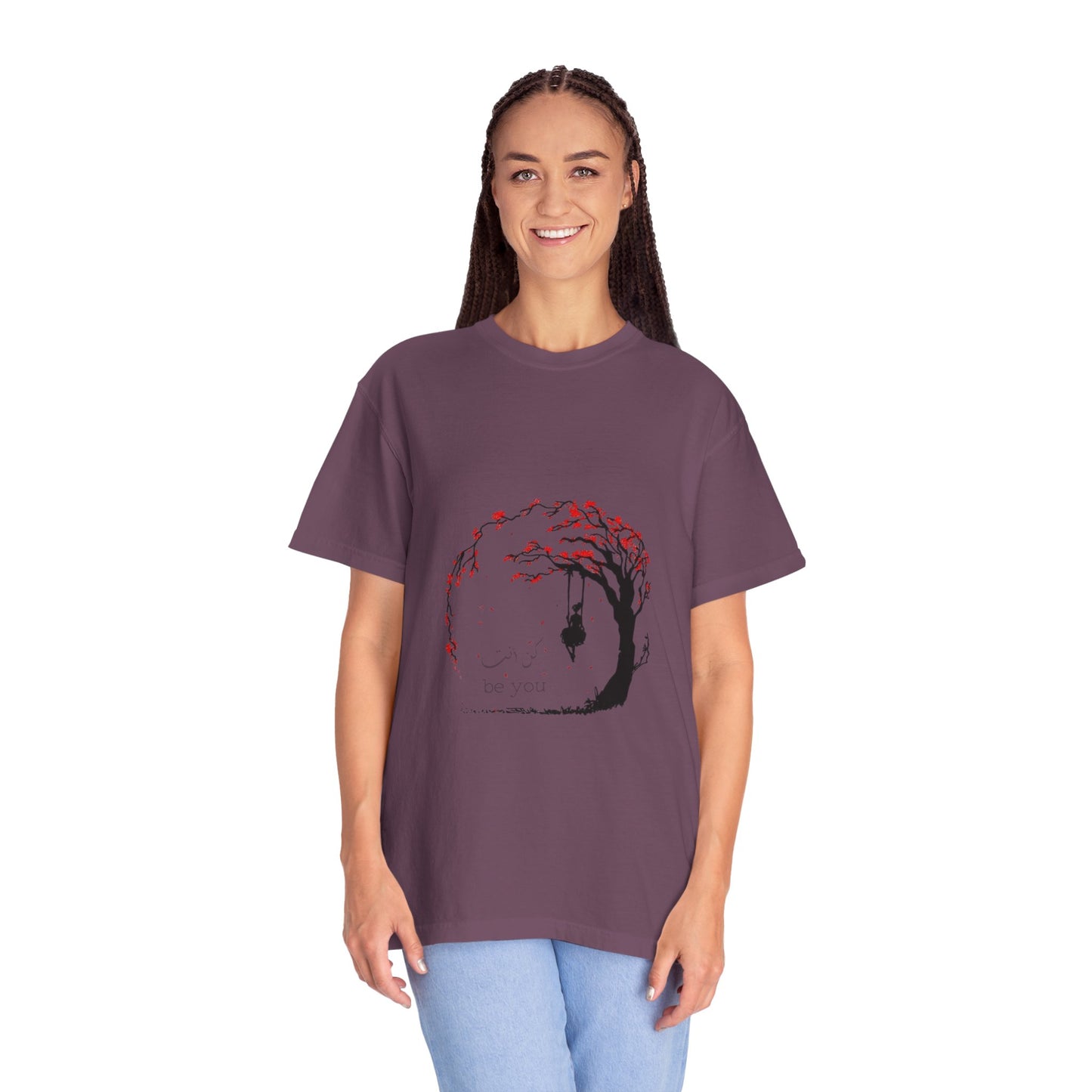 Model wearing the Cherry Blossom Unisex T-Shirt, highlighting its relaxed fit and eco-friendly fabric in a casual setting.