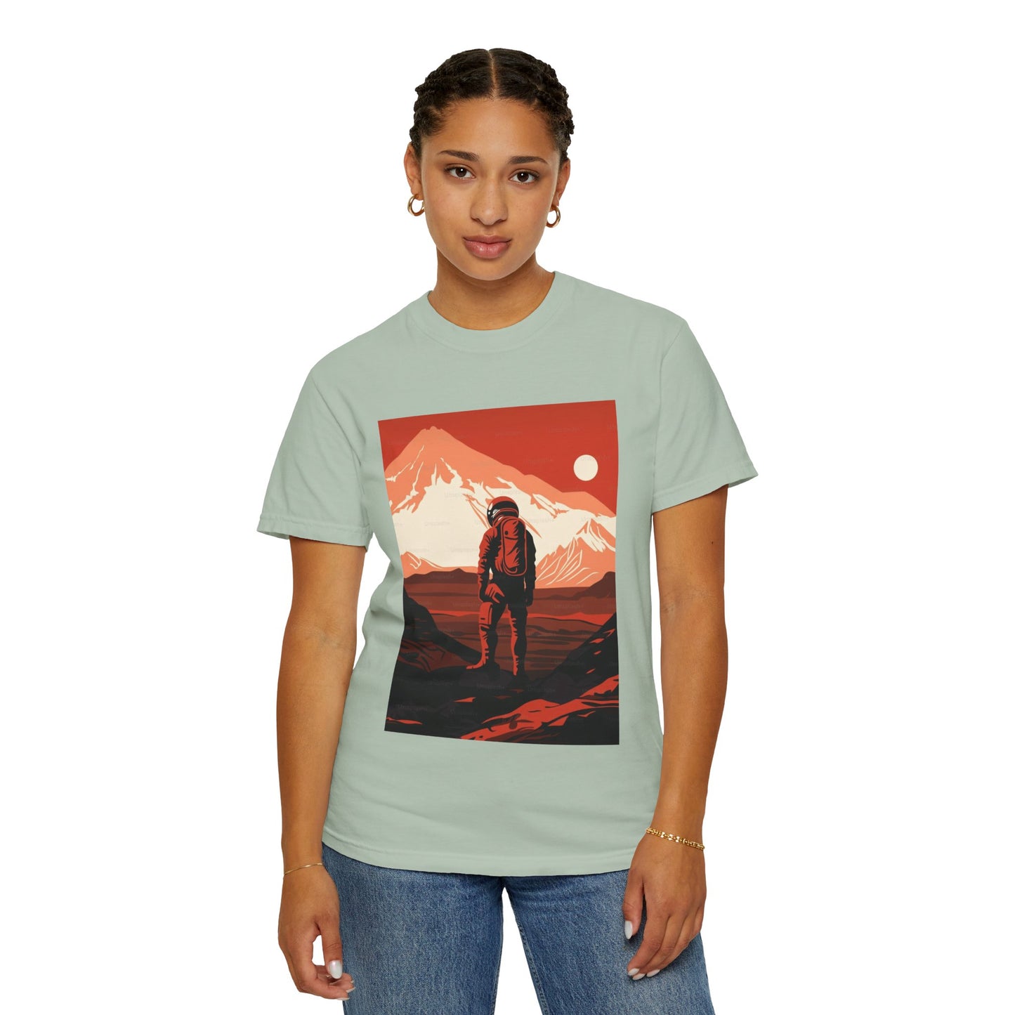 Eco-conscious individual wearing Man On Mars Graphic T-Shirt - Eco-Friendly Organic Cotton, Oversized Unisex Boho Tee in a garden.