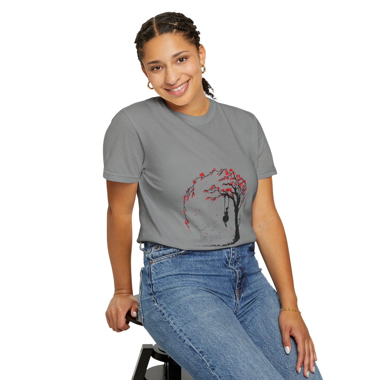Model wearing the Cherry Blossom Unisex T-Shirt, presenting a stylish and comfortable look for eco-conscious consumers.