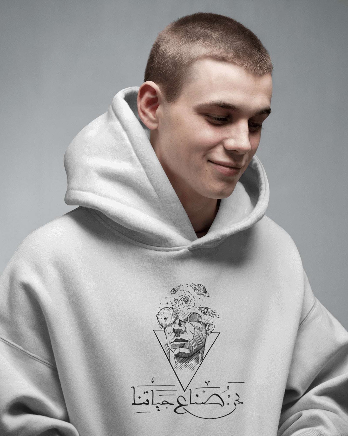 We Are Future Creators Graphic Boho Oversized Hoodie in eco-friendly organic cotton with unique design showcased on a stylish model.
