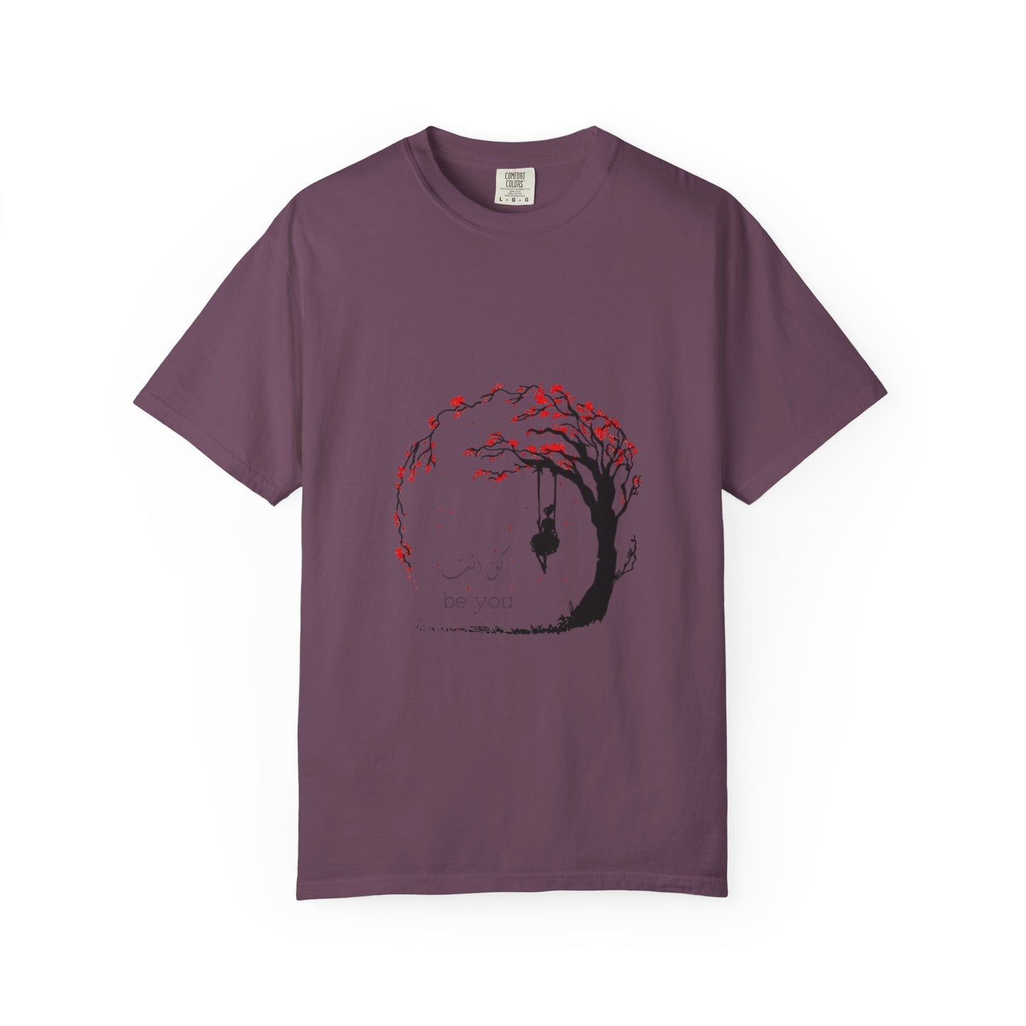 Woman styling the Cherry Blossom Unisex T-Shirt with high-waisted jeans, perfect for a casual outing and embodying sustainable fashion.