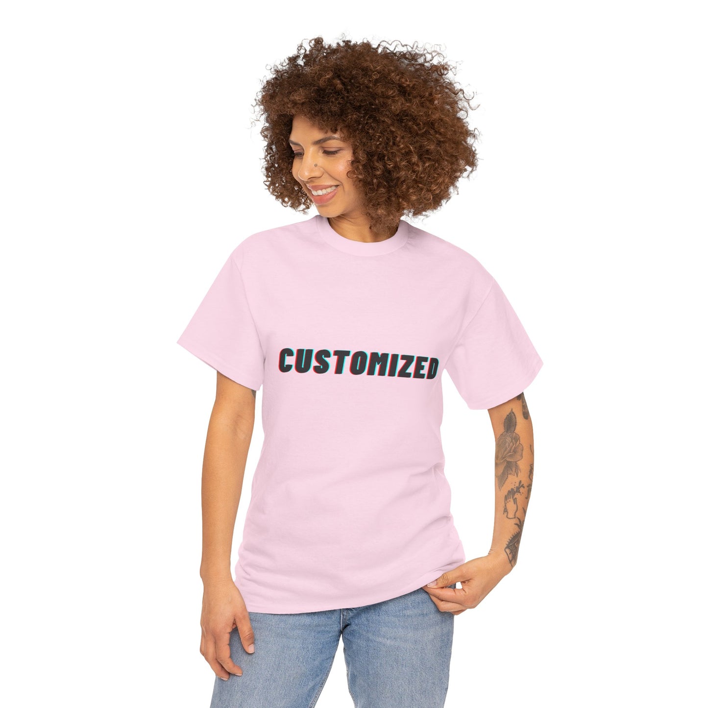 Group of friends wearing Personalized Unisex Heavy Cotton Tees, enjoying outdoor fun while showcasing their individual styles.