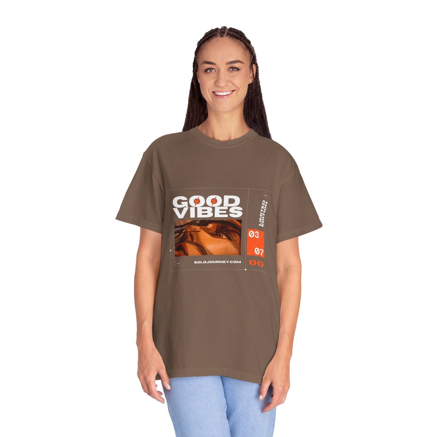 The Good Vibes Graphic Design Pullover - Vintage Boho Oversized T-Shirt in Organic Cotton packed for travel, showcasing its versatility and travel-friendly design.