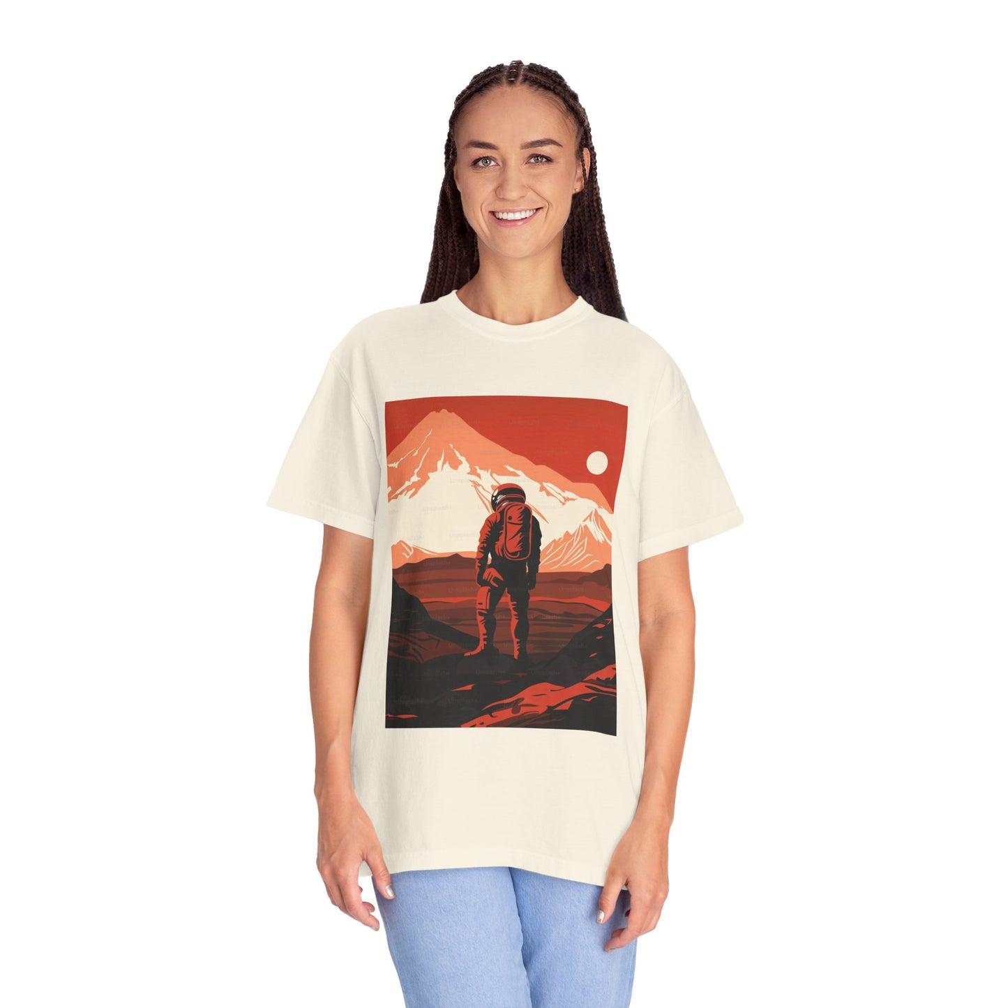 Flat lay of the Man On Mars Graphic T-Shirt - Eco-Friendly Organic Cotton, styled with accessories for a trendy look.