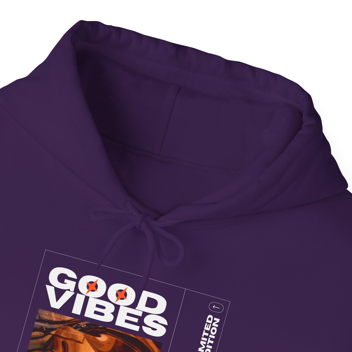 Good Vibes Unisex Heavy Blend Hoodie in a relaxed fit, demonstrating versatility for both casual outings and cozy lounging.