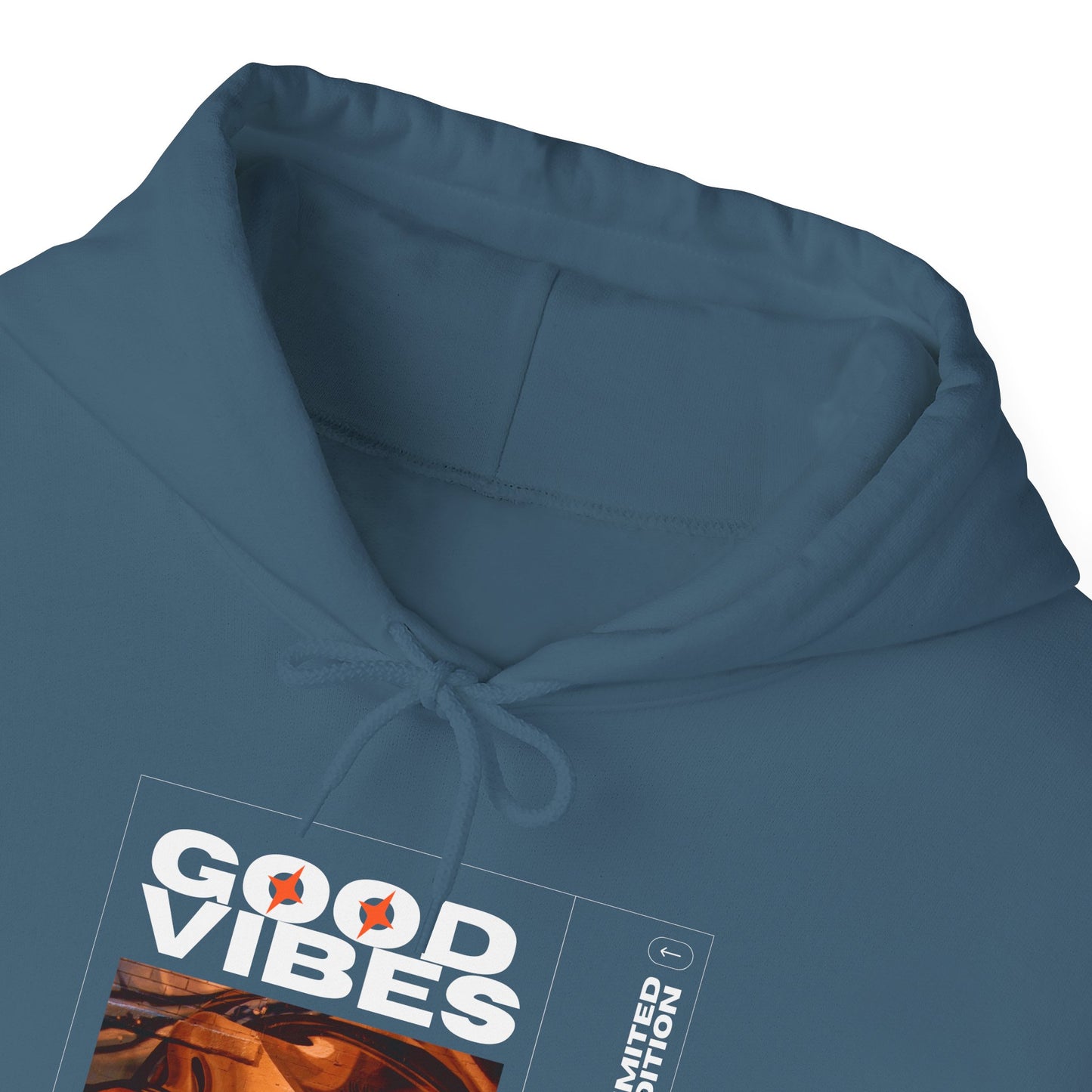 Model wearing Good Vibes Unisex Heavy Blend Hoodie, featuring unique graphic prints and showcasing sustainable fashion.