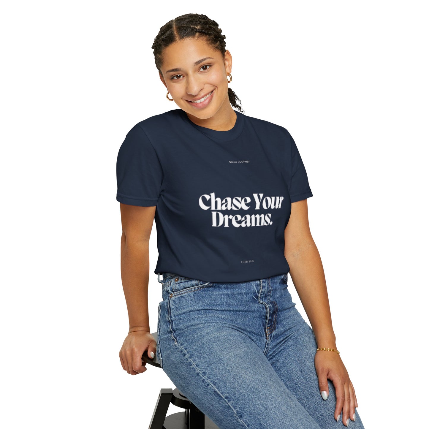 Chase Your Dreams Vintage Aesthetic Pullover - Eco-Friendly Oversized Boho T-Shirt hanging on a clothing rack with vibrant colors.