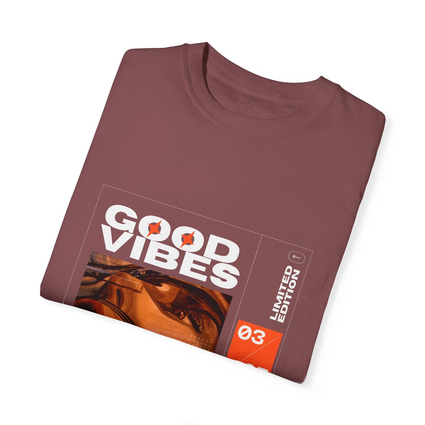 Person lounging in the Good Vibes Graphic Design Pullover - Vintage Boho Oversized T-Shirt, embodying a relaxed lifestyle.