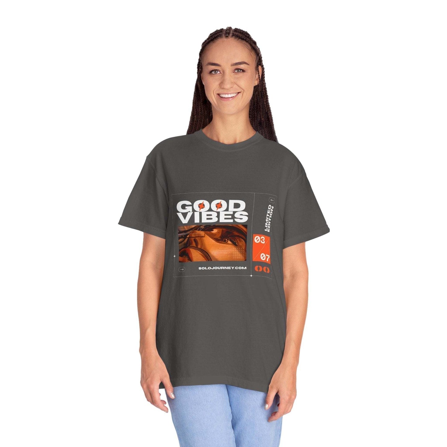 Good Vibes Graphic Design Pullover - Vintage Boho Oversized T-Shirt in Organic Cotton showcasing artistic print on a model in a casual setting.