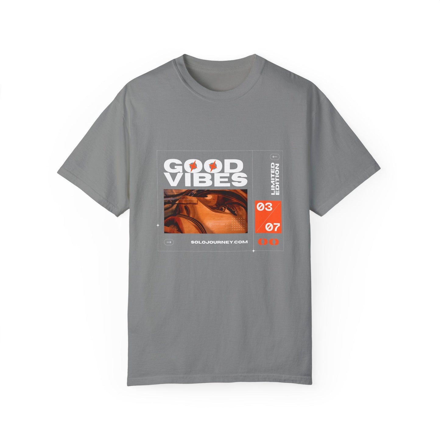 Flat lay of the Good Vibes Graphic Design Pullover - Vintage Boho Oversized T-Shirt in Organic Cotton, styled with accessories for a trendy look.