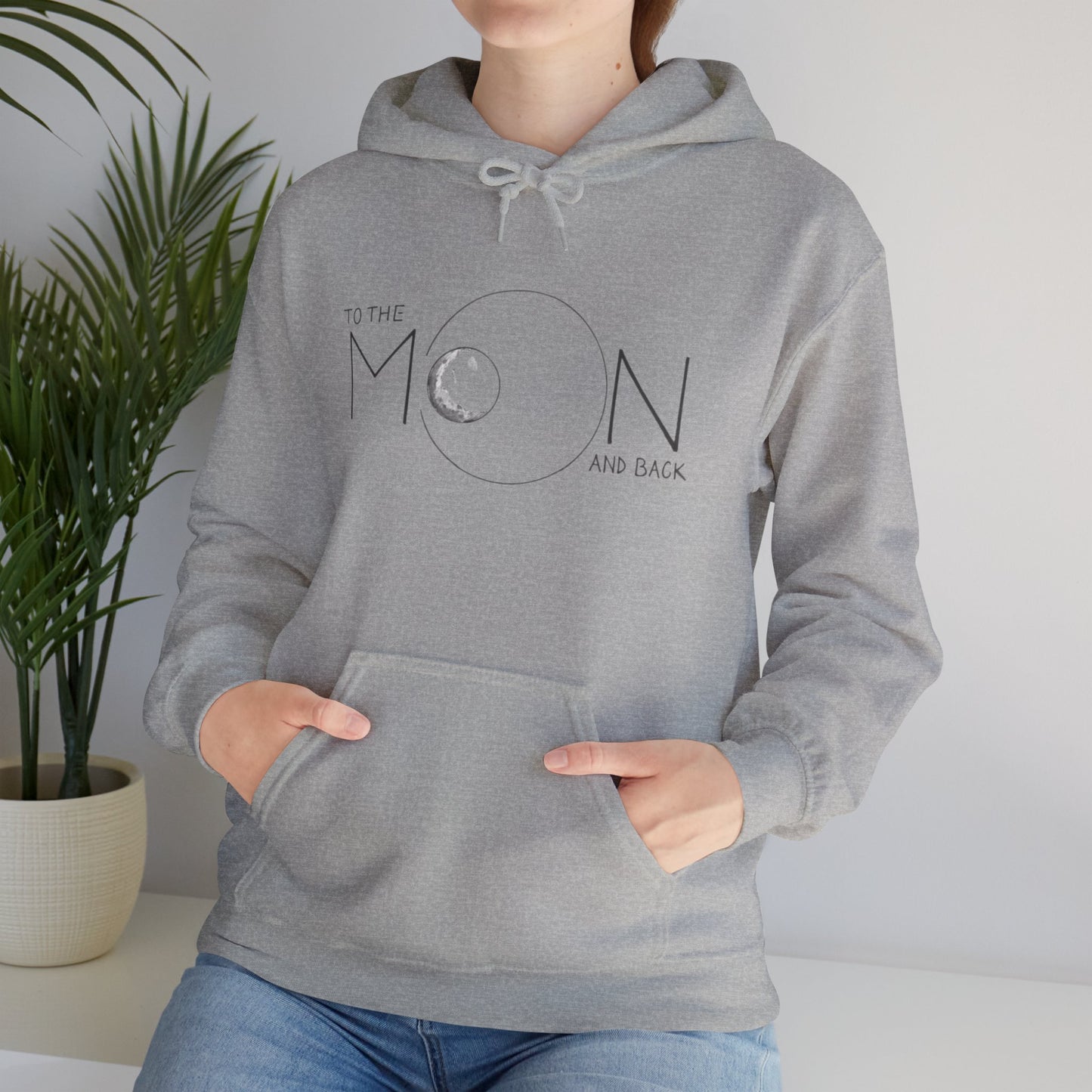 Comfortable and stylish To The Moon! Boho Western Sweatshirt displayed on a hanger, perfect for layering or wearing solo during festive seasons.