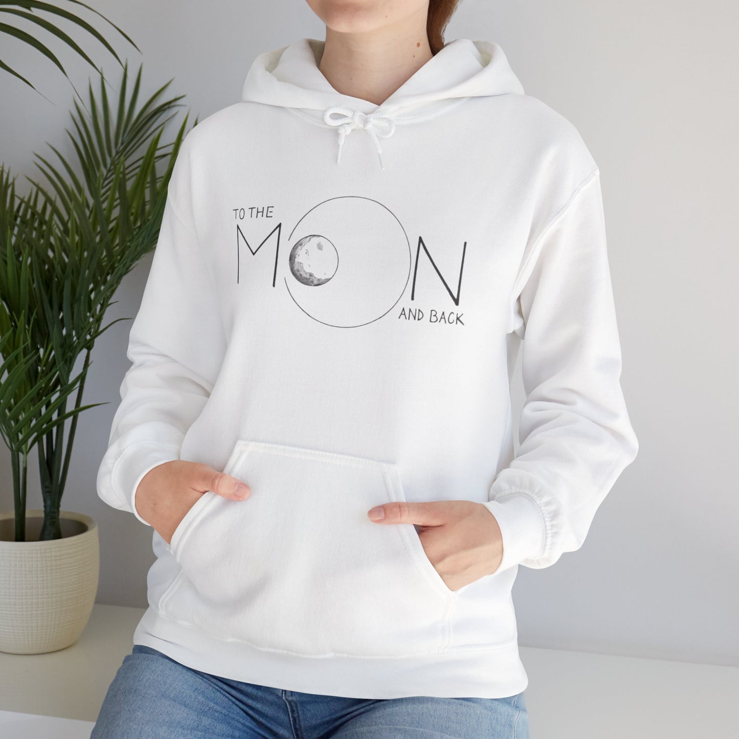 Lifestyle image of the To The Moon! Boho Western Sweatshirt - 100% Organic Cotton Oversized Pullover worn in a cozy setting.