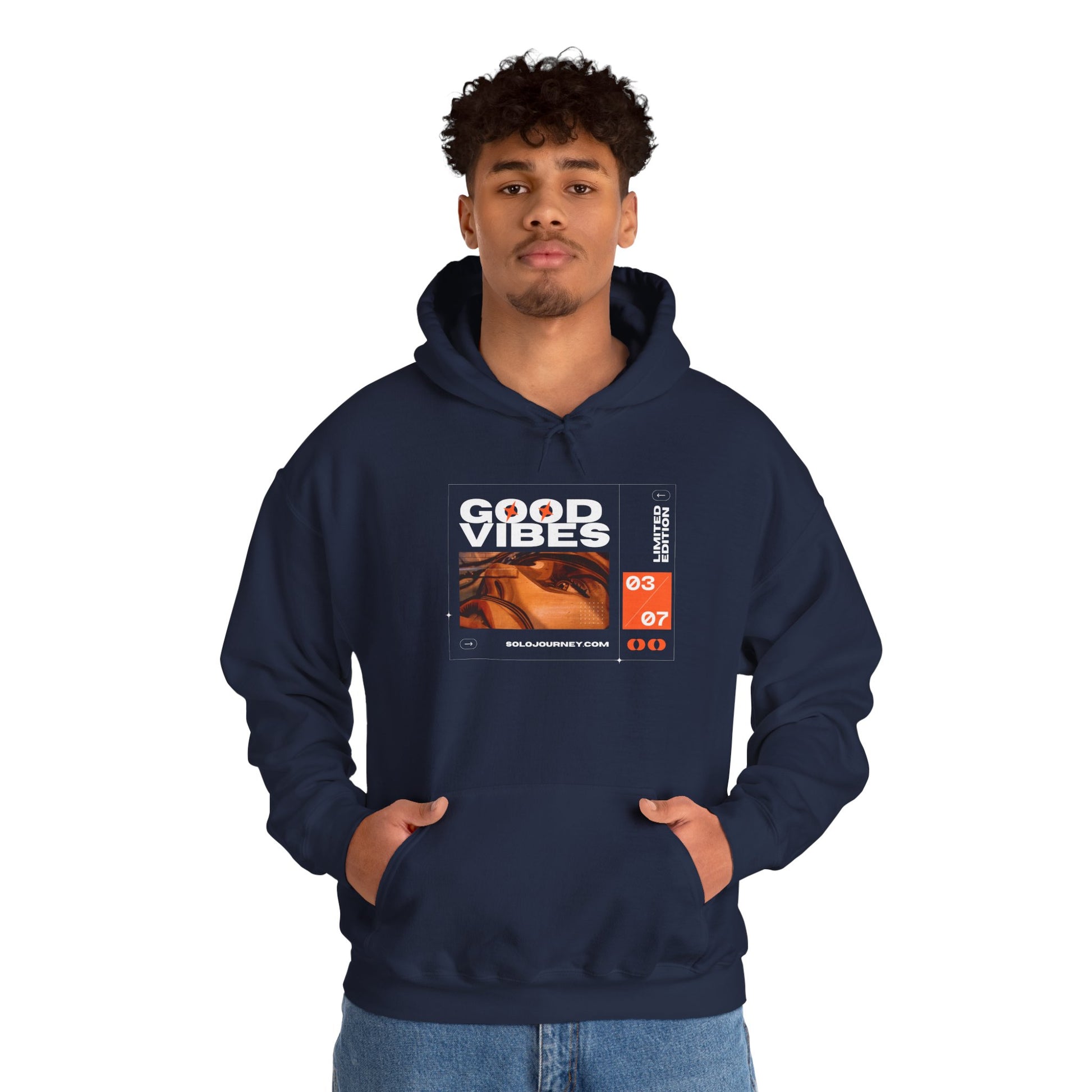 Flat lay of the Good Vibes Unisex Heavy Blend Hoodie paired with casual accessories, emphasizing its versatility for fashion-forward individuals.