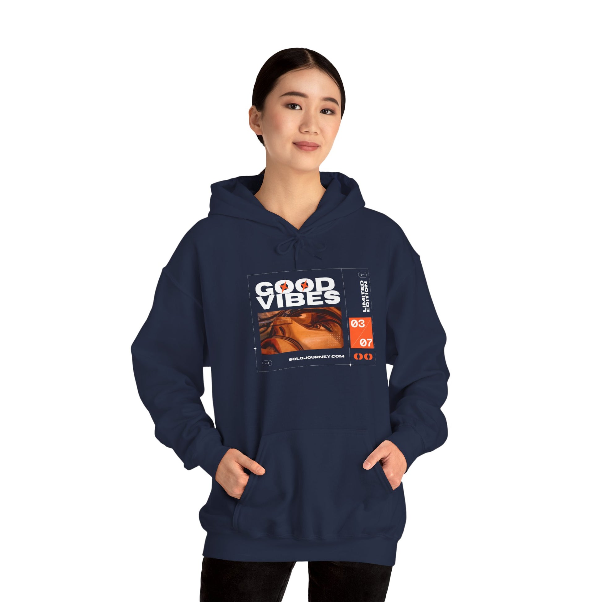Back view of the Good Vibes Unisex Heavy Blend Hoodie, demonstrating the cozy fit and eco-friendly materials ideal for any casual occasion.