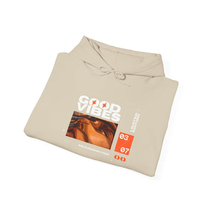 Close-up of the Good Vibes Unisex Heavy Blend Hoodie, showcasing its soft, breathable organic cotton fabric.