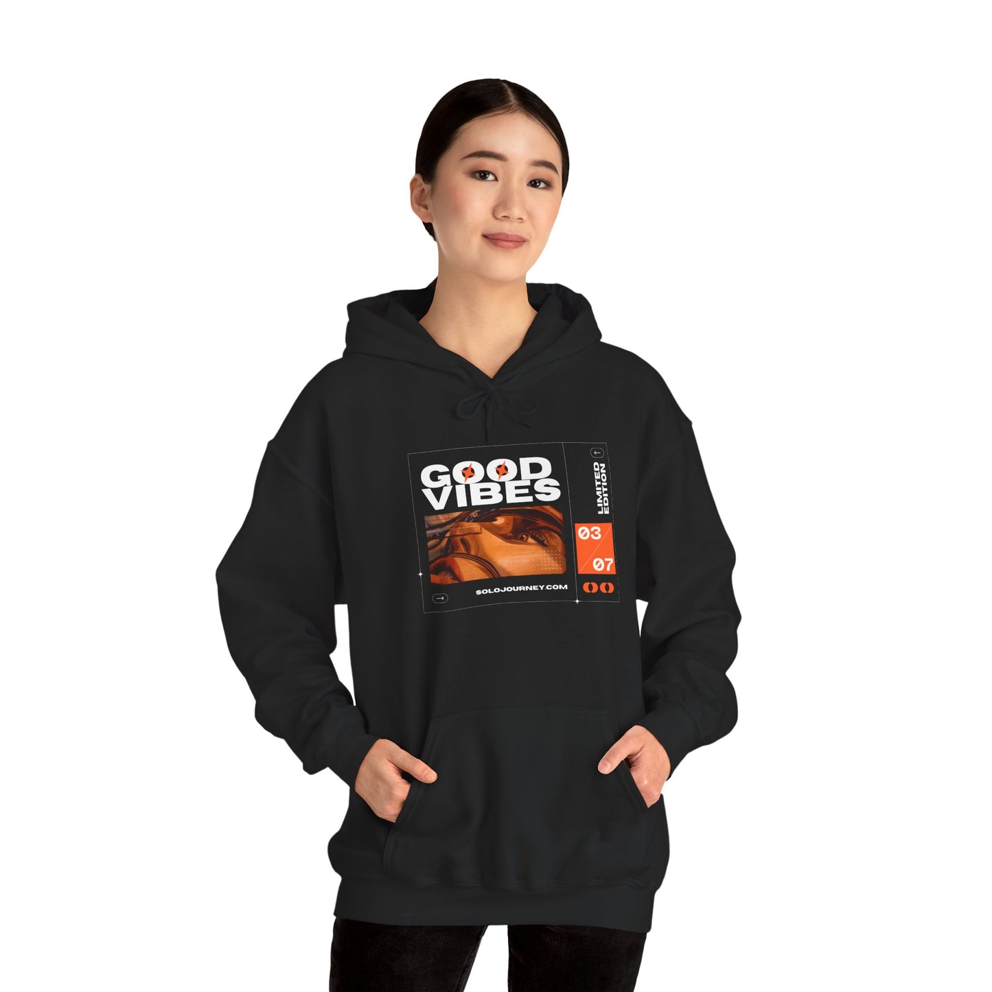 Good Vibes Unisex Heavy Blend Hoodie - Eco-Friendly Organic Cotton Sweatshirt showcasing comfort and style, perfect for casual outings or lounging.