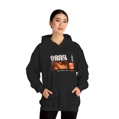 Good Vibes Unisex Heavy Blend Hoodie - Eco-Friendly Organic Cotton Sweatshirt showcasing comfort and style, perfect for casual outings or lounging.
